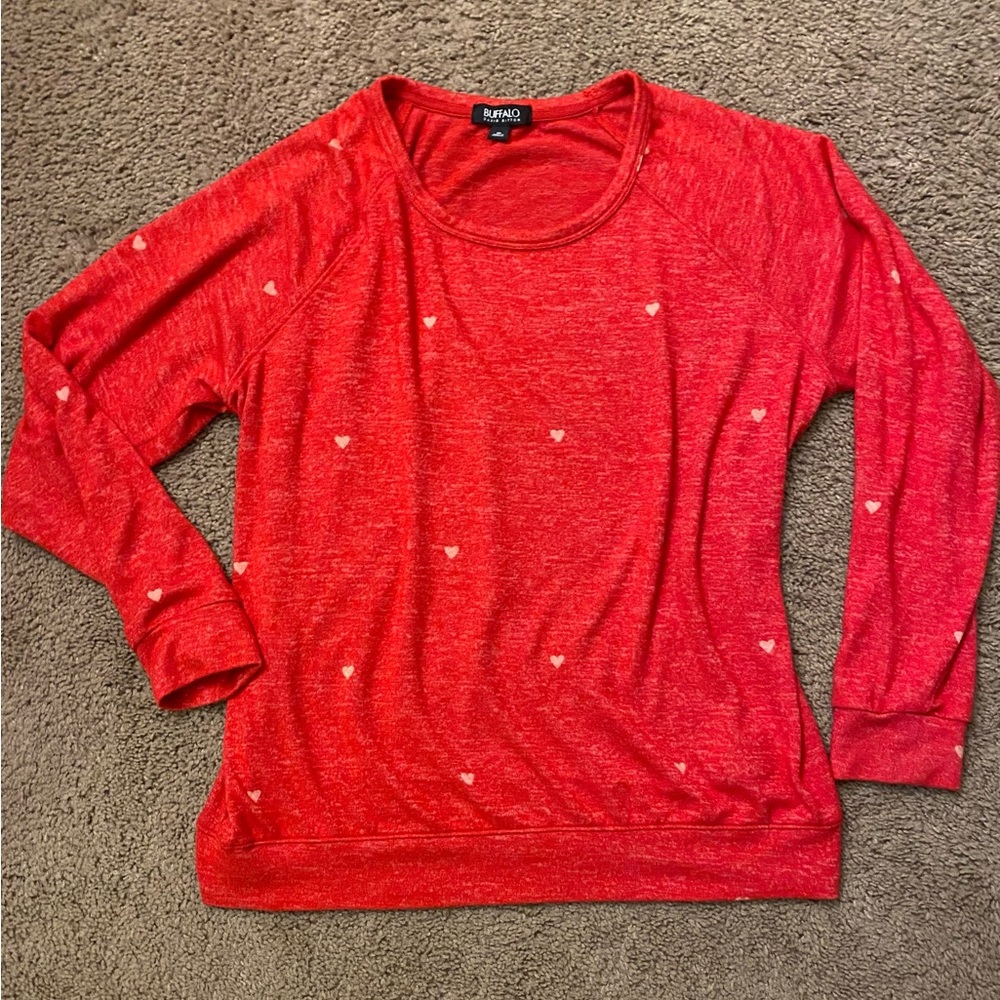 Red sweater with hearts